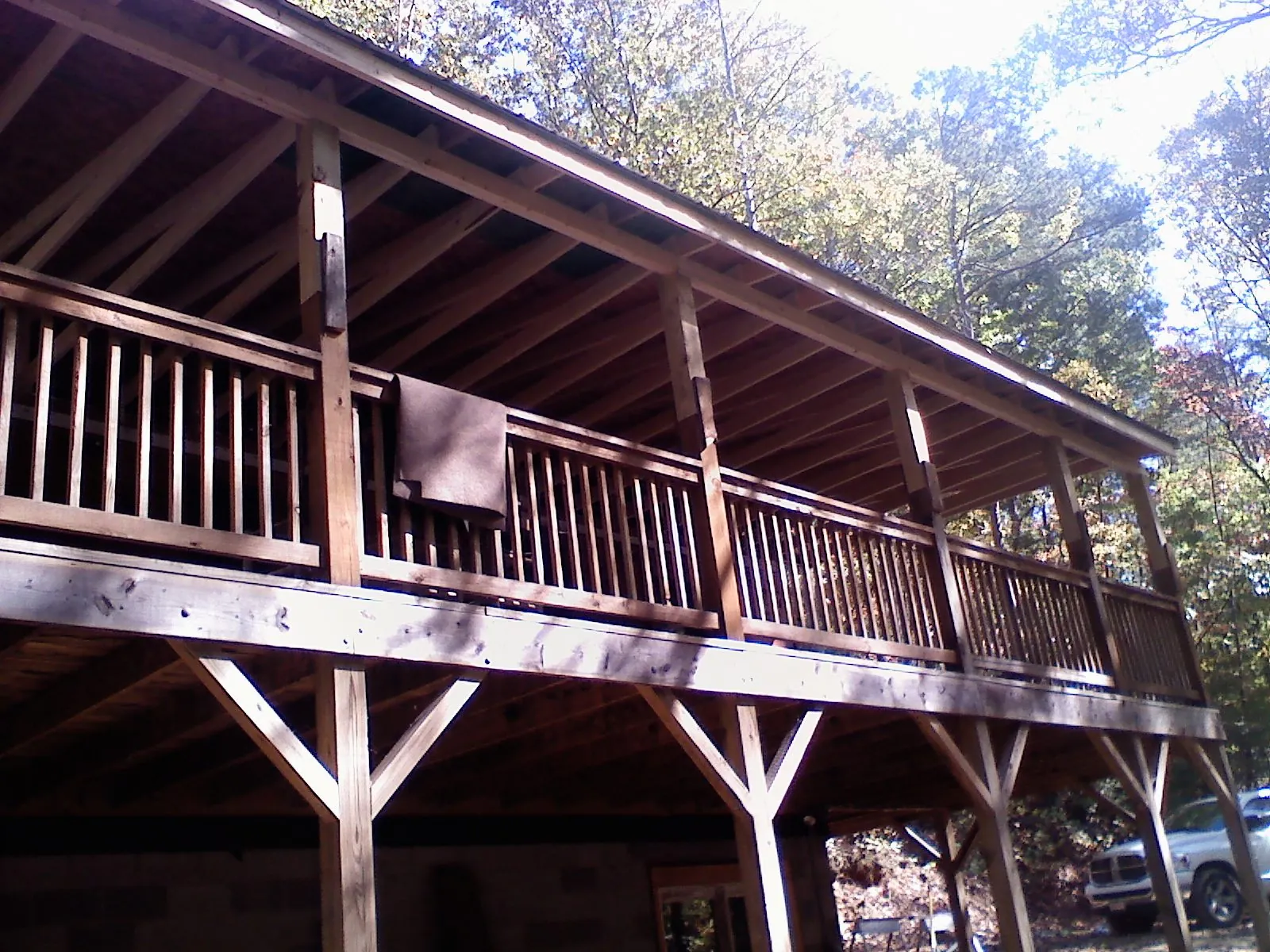 Timber framing under a new elevated porch and deck — Roof Leak Repair in Lake Pleasant by Roofing Brothers